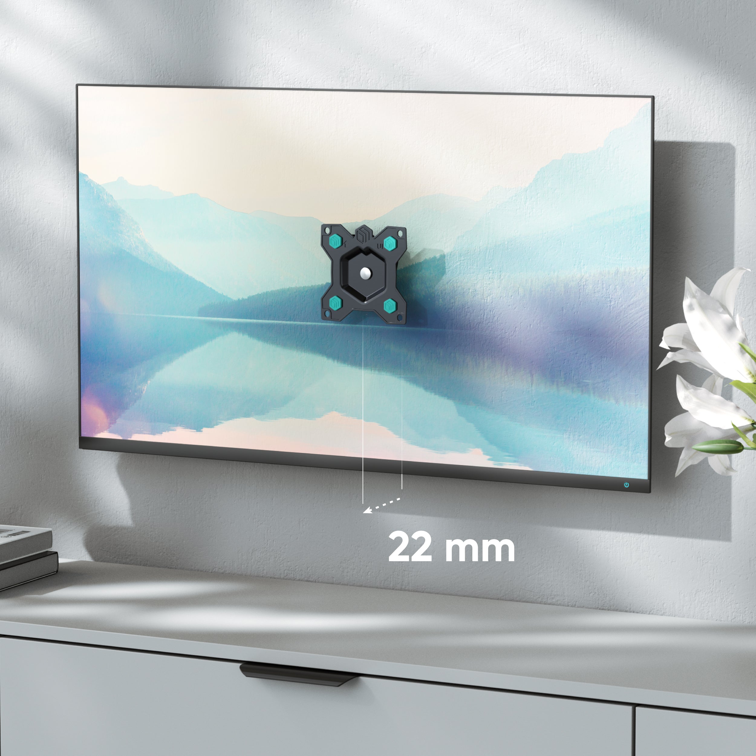 Uchwyt ścienny zamontowany na telewizorze, odległość od ściany 22 mm.