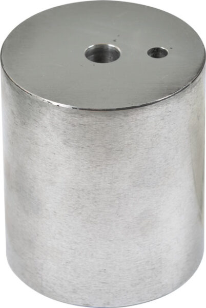 Metalowy cylinder z dwoma otworami w górnej płaszczyźnie.